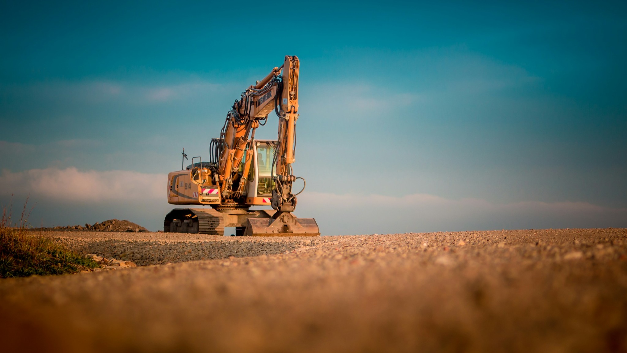 Excavator preparing a construction site
